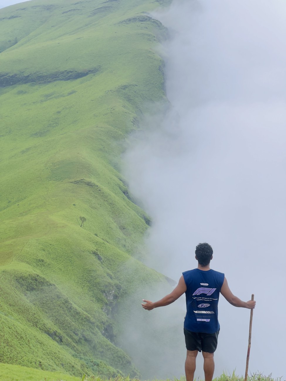Trekker on the misty Netravati ridge